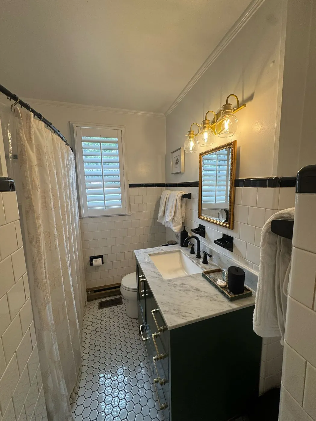 Sparkling bathroom vanity and tile cleaned by Royale Cleaning in Richmond, Virginia